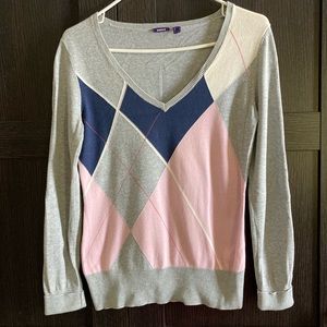 Light V-Next sweater. Imported from Europe.